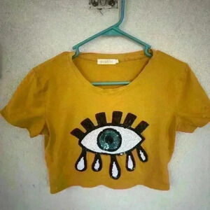 Cropped eyeball graphic tee. Size large. Sequins